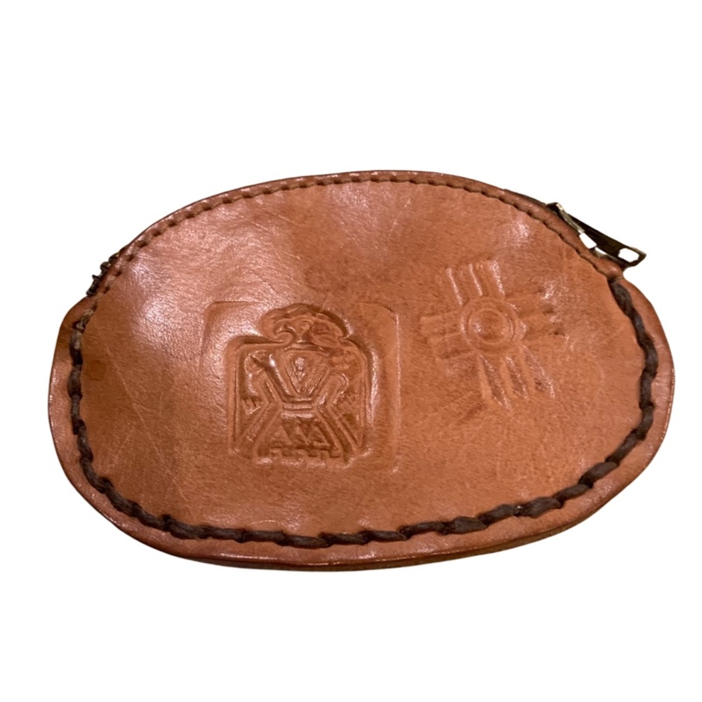 Pounche Coin change holder. Leather hand tooled metal zipper.